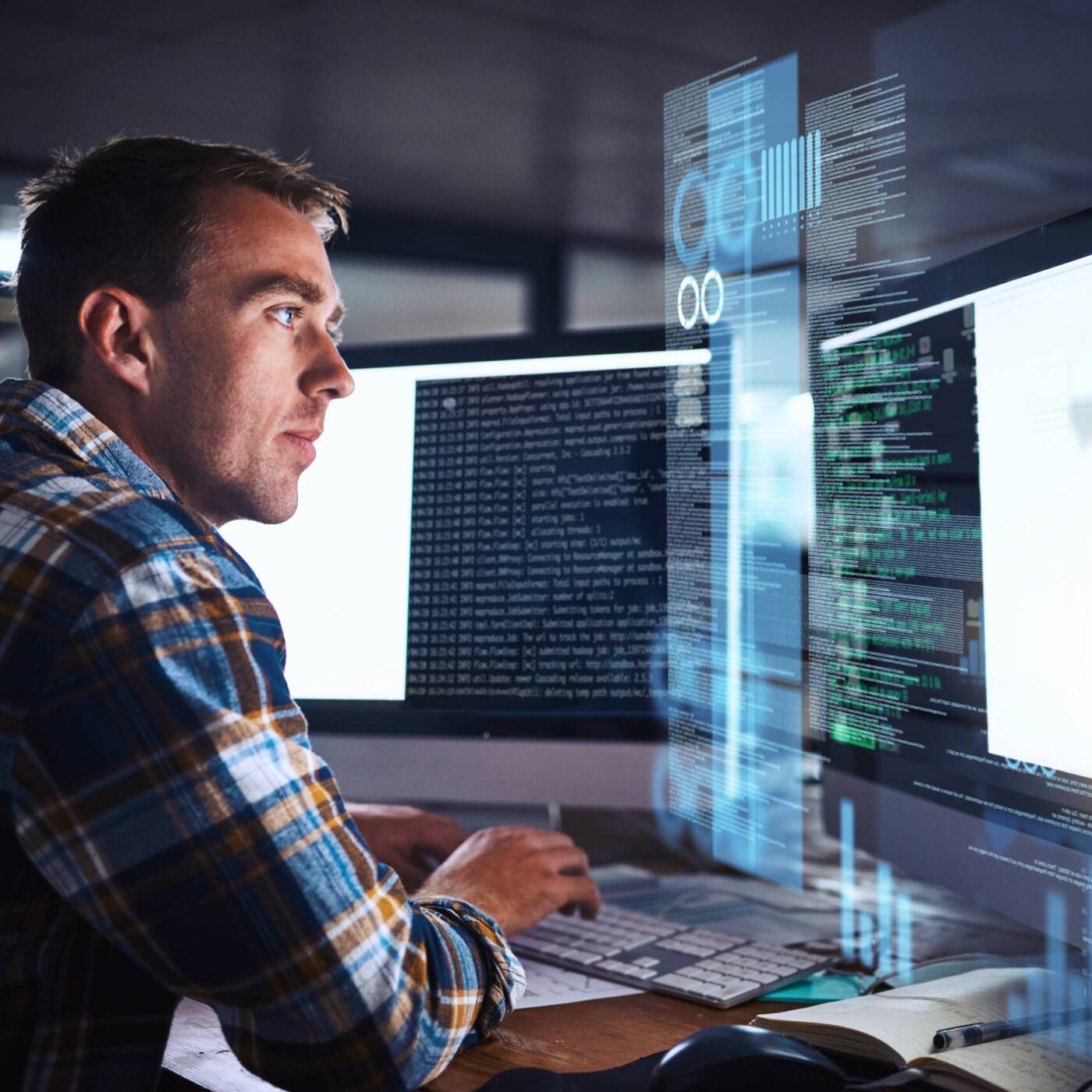 Man working on computer in information technology career